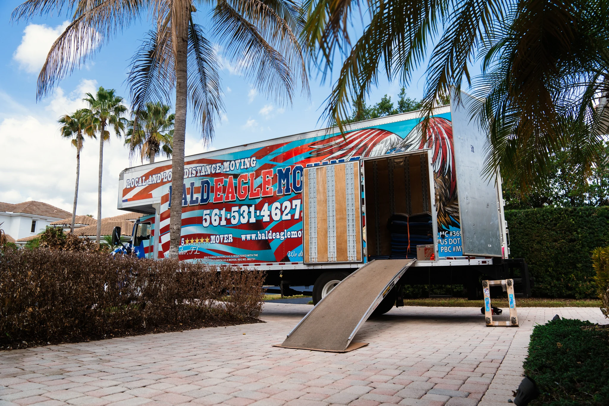 Bald Eagle Moving crew preparing a truck for long-distance service