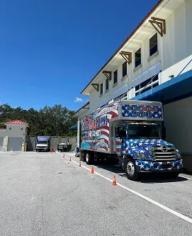 Bald Eagle Moving branded truck on location